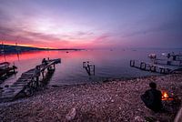 Zonsondergang in Lesvos met Afghaanse vissers, Griekenland, Lesbos