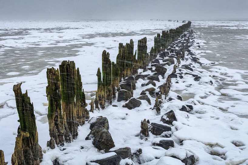 Snow shower over the Waddensea by Peter Bolman