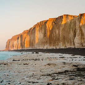 Cliffs at sea at sunset by Robin van Steen
