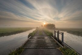 Sunrise over the polder by Raoul Baart