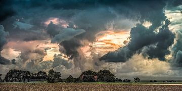 Colourful clouds above the Frisian Wadden dike near Blija by Harrie Muis