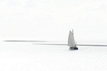 Lonely Sailing Ship on the Wadden Sea by André Post