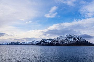Mountains and rocks in winter near Vesterålen in Norway by Rico Ködder