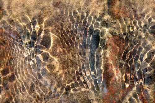 Water ripples at the Loenen waterfall