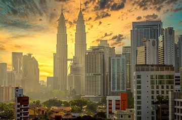 View of the centre of Kuala Lumpur in Malasia with the Petronas Towers at dawn by Dieter Walther
