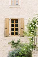 Provence floral wall | Beige sand brick wall with window | French summer vibe photo art print
