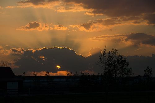 Zonsondergang van Cor Bak