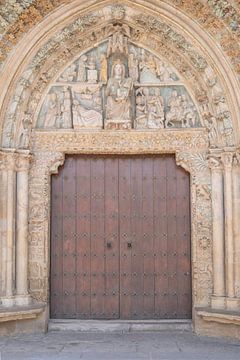 Brown church doors in Olite, Spain - vintage street and travel photography by Christa Stroo photography