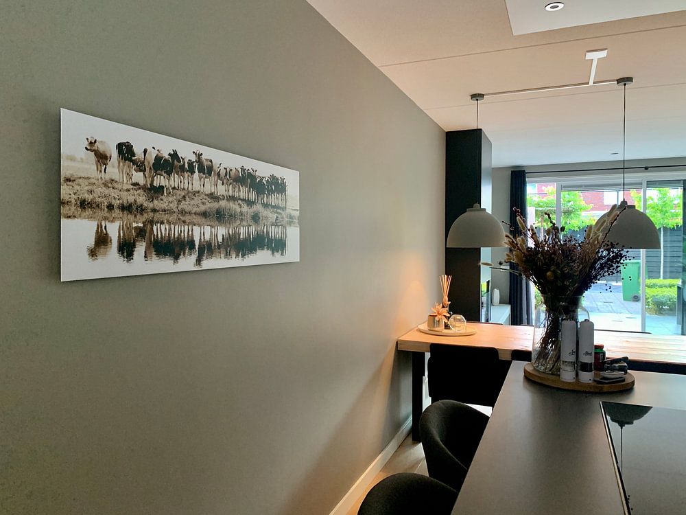 Kühe in einer Reihe (sephia) von Annemieke van der Wiel