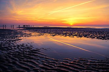 Zonsondergang bij eb