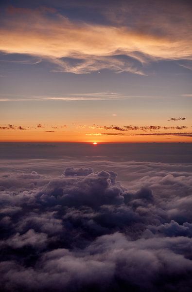 Sunset above the clouds by qtx