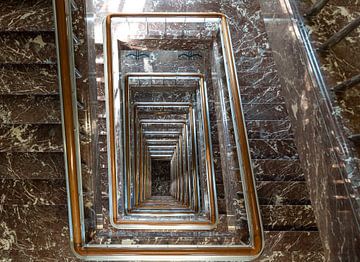 Marble swirling staircase, view from above by Werner Lerooy