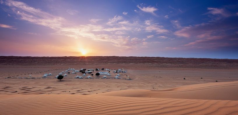 Desert camp in Oman at sunset by Tilo Grellmann