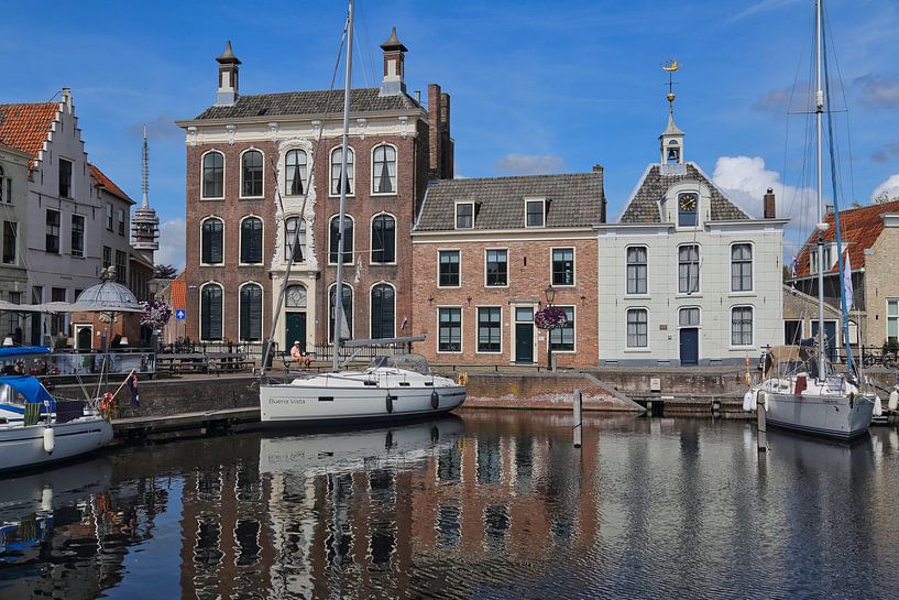 Sail boats lie in the historical harbor of Goes, The Netherlands by Jan Kranendonk