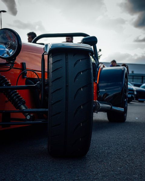 Orange self-built car front Enschede . by iwan faber