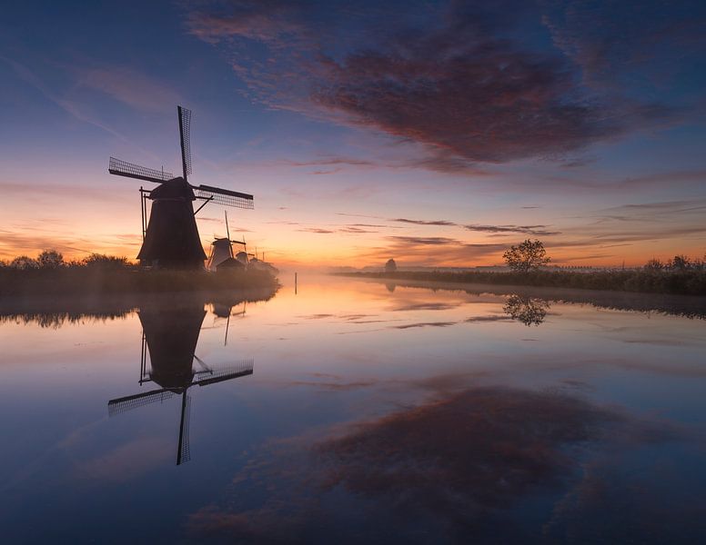 Reflections in Kinderdijk by Raoul Baart