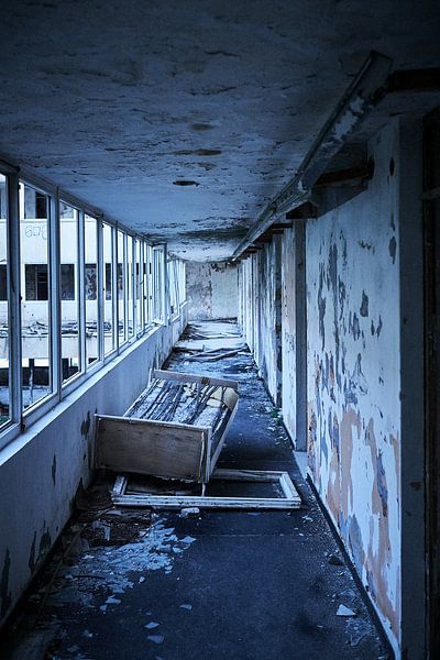 Bed in abandoned hotel by Karel Ham