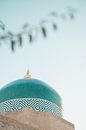 Turquoise mozaïek koepel | reisfotografie print | Khiva, Oezbekistan van Kimberley Jekel thumbnail