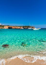 Idyllic bay with yachts boats at the beautiful seaside on Mallorca by Alex Winter