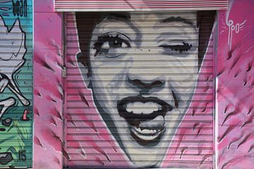 Cheeky lady, portrait of a mischievous woman, Street art in Athens by My Footprints