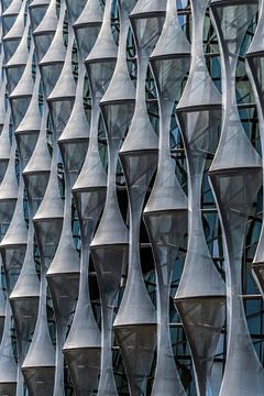 Detail photo of unusual shapes on the outside of a building by Bob Janssen