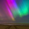 Noorderlicht op het strand van Patrick Herzberg