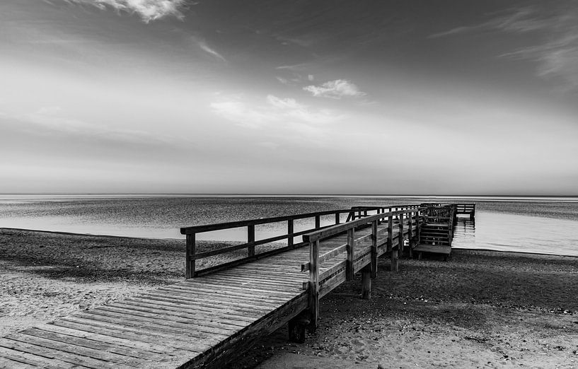 The jetty by the still sea by Werner Reins