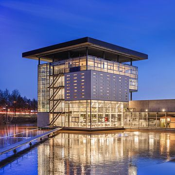 Modern design corporate architecture during twilight by Tony Vingerhoets