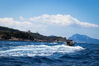 Two boats along the Amalfi coast en route to the island of Capri