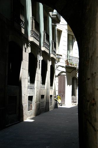 Sfeerbeeld Italiaanse stad met Vespa