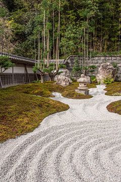 Japanese zen garden with pebbles and bamboo by Mickéle Godderis