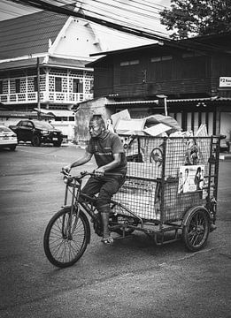 Man on bicycle in ChiangMai by Bart van Lier