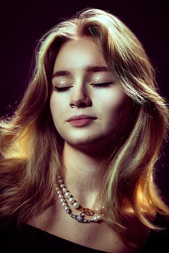 Peaceful studio portrait lady