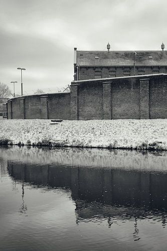 Das schneebedeckte Fahrrad an der Singel in Utrecht von André Blom Fotografie Utrecht