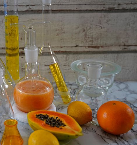 Papaya cocktail met rum, citroen en sinaasappel