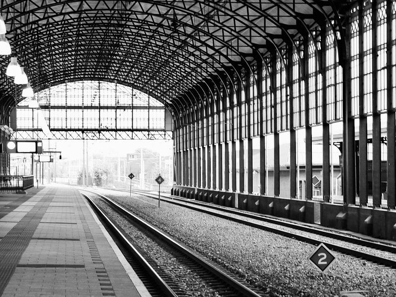 The Hague Hollands Spoor station without a train in black and white by Judith van Wijk
