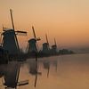 Zonsopkomst bij Kinderdijk van Koos de Vries