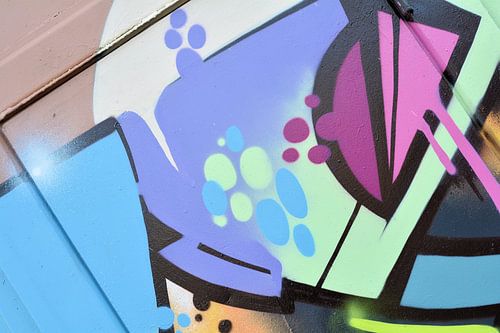 Detail van graffiti op de muur van het huis