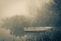 Picture of an old rowing boat on a cold foggy morning