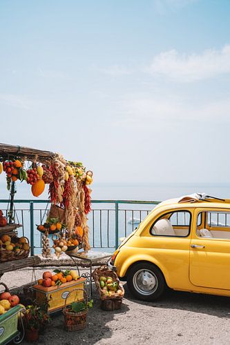 Vintage yellow fiat 500 in the Amalfi Coast