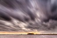 Dark clouds drifting over a lake in Groningen by Evert Jan Luchies thumbnail
