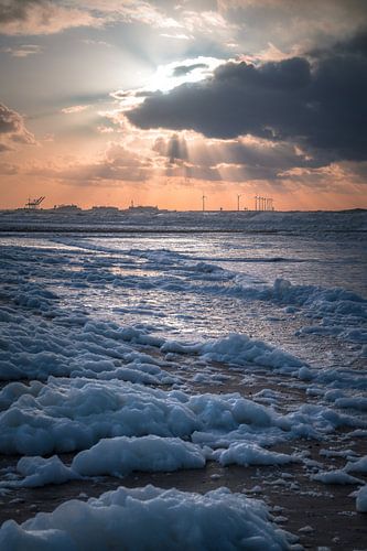 Schuim op het strand