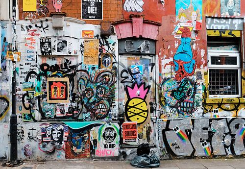 Graffiti muur, Shoreditch, Londen van Roger VDB