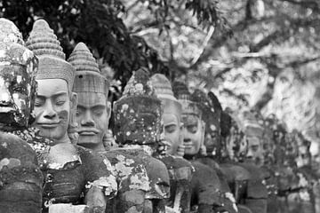 Figures in the temple complex of Angkor by Levent Weber