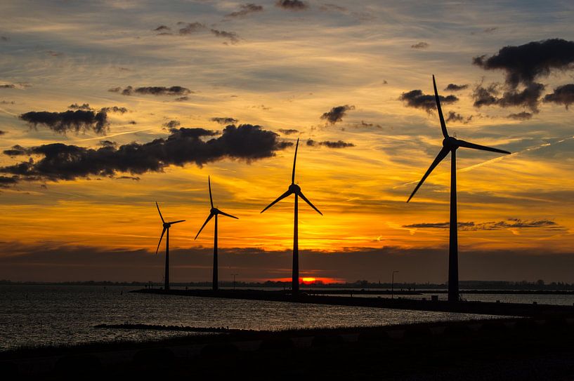 Winter sky with windmills van Brian Morgan