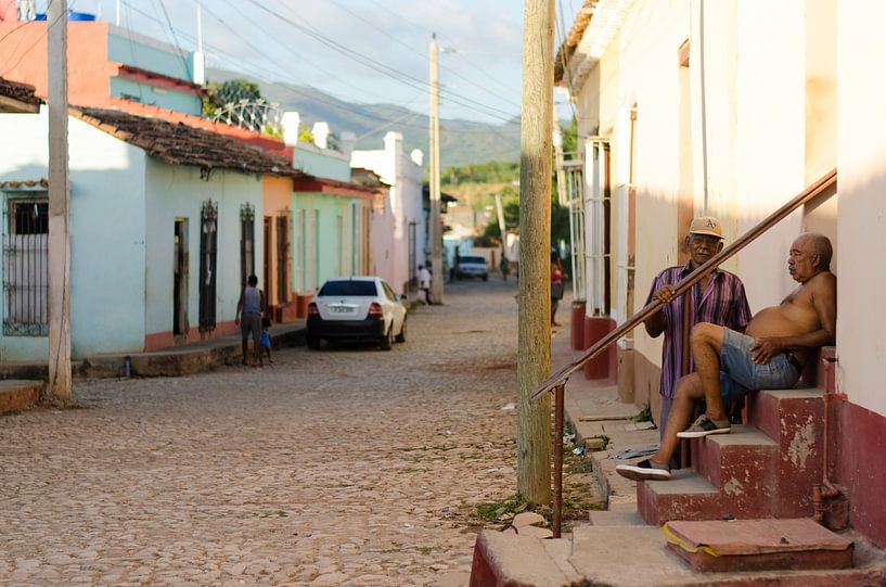Cubans relaxing in Trinidad, Cuba by Olivier Van Acker