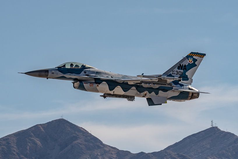 A beautifully colored General Dynamics F-16C Fighting Falcon takes off from Nellis Air Force Base du by Jaap van den Berg