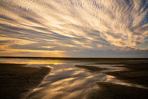 Coucher de soleil sur la plage d'Ameland