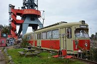 Alte Straßenbahn und Sitz auf dem NDSM-Hof in Amsterdam von My Footprints Miniaturansicht