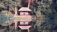 Tuinhuisje aan het water
